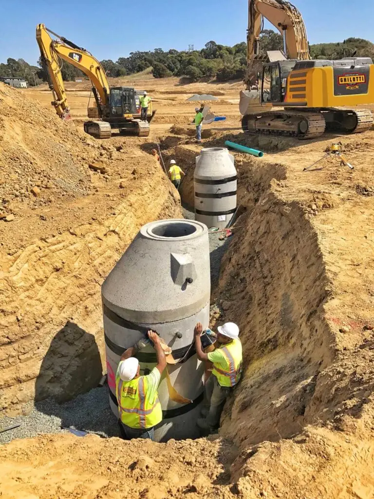 Ghilotti crew workers in a trench during a sewer line project