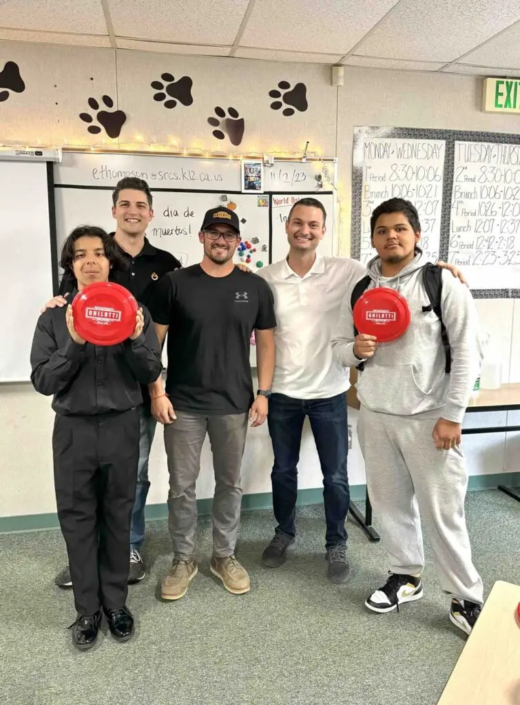 Ghilotti staff pose with high school kids